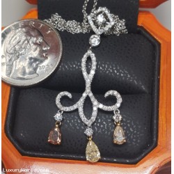 Auction Monday 6/24/24 $11,320 2.11Ctw 3 Natural Fancy Color Diamond and Near Colorless Diamond Pendant 18k White Gold